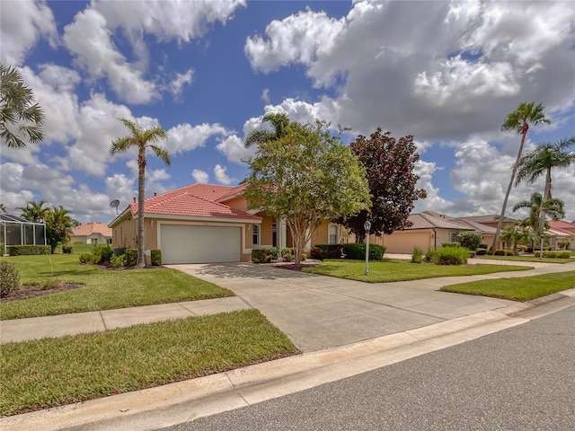 view of front facade with a garage and a front yard