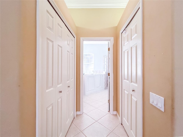 hallway with light tile patterned floors