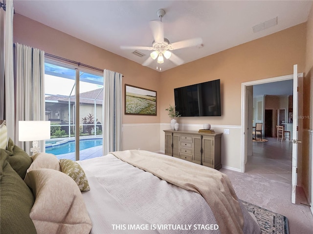 bedroom with carpet, access to outside, visible vents, and baseboards