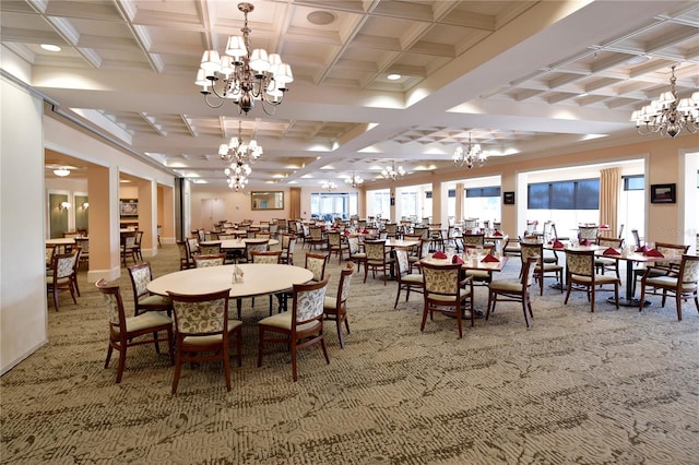 carpeted dining area with coffered ceiling, plenty of natural light, and an inviting chandelier