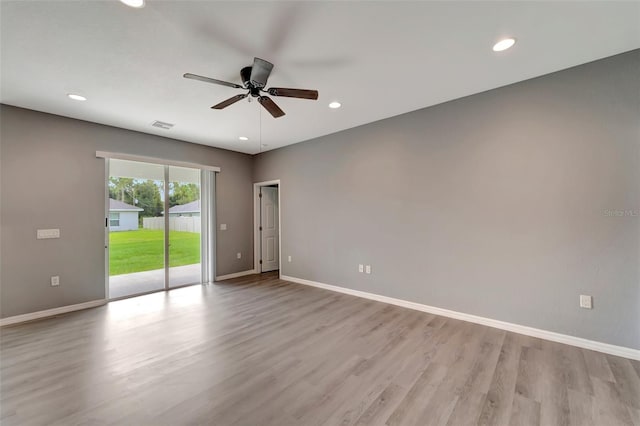 unfurnished room featuring light hardwood / wood-style floors and ceiling fan