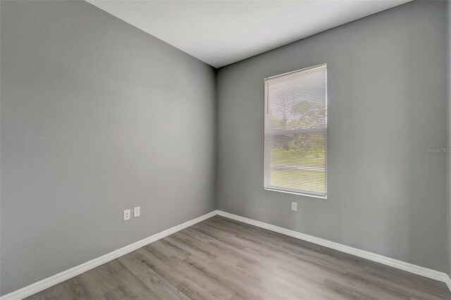 empty room featuring hardwood / wood-style floors