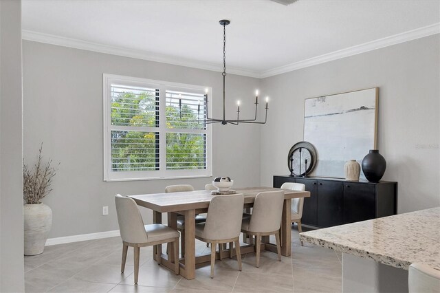 tiled dining room with crown molding and a chandelier