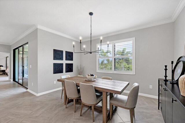 tiled dining space featuring ornamental molding and an inviting chandelier