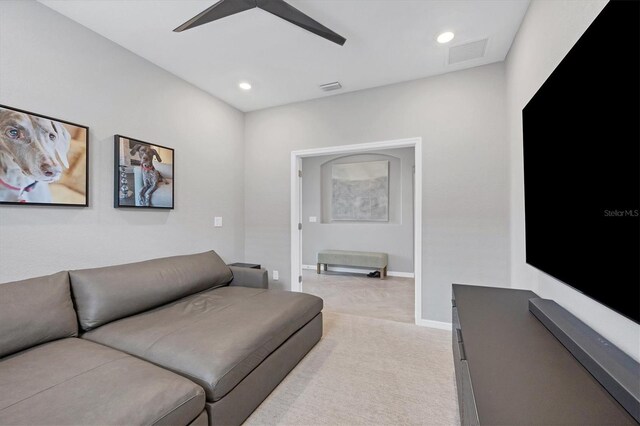 living room featuring light colored carpet