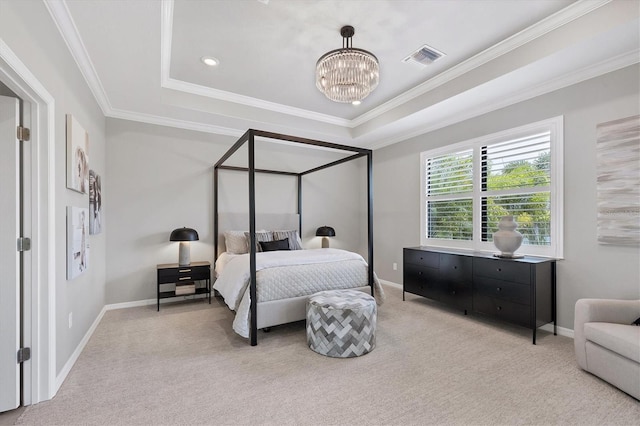 carpeted bedroom featuring a chandelier, a raised ceiling, and ornamental molding