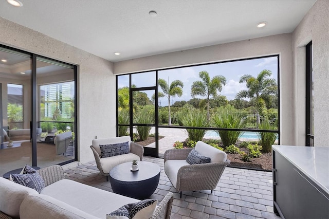 sunroom / solarium with a wealth of natural light