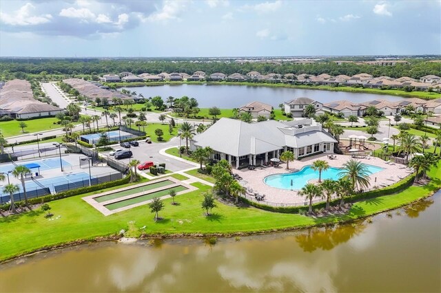 drone / aerial view with a water view