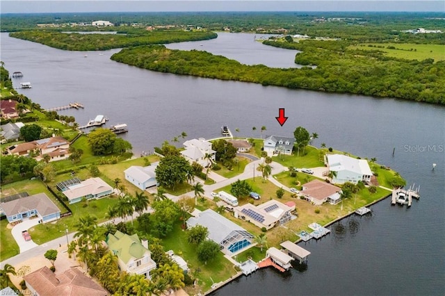 bird's eye view with a water view