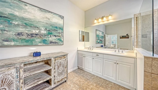 bathroom featuring tile patterned flooring and dual bowl vanity