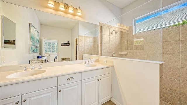 bathroom with dual vanity