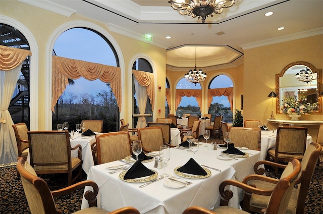 dining area with a chandelier and ornamental molding