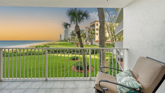 balcony at dusk with a water view