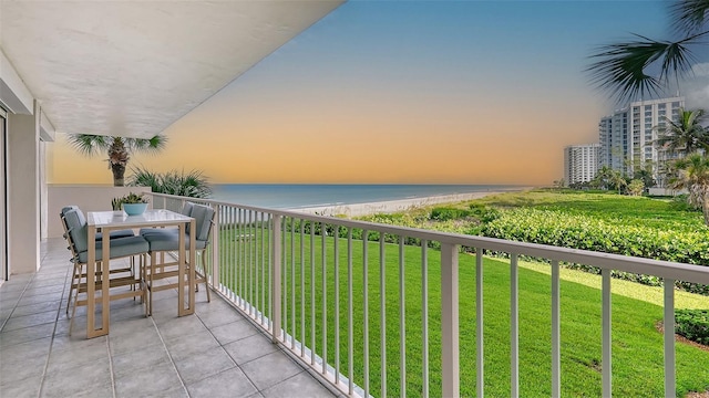 balcony at dusk with a water view