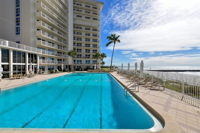 view of swimming pool featuring a patio