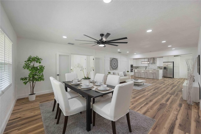 353 Suwanee Ave, Sarasota, FL 34243 - dining room featuring a ceiling fan, visible vents, recessed lighting, and light wood-type flooring