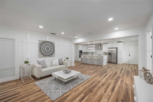 living room featuring light hardwood / wood-style floors