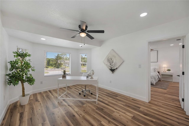 353 Suwanee Ave, Sarasota, FL 34243 - unfurnished office featuring baseboards, wood finished floors, and a ceiling fan