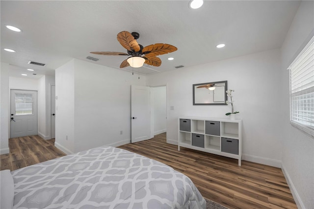 353 Suwanee Ave, Sarasota, FL 34243 - bedroom with wood finished floors, multiple windows, and visible vents