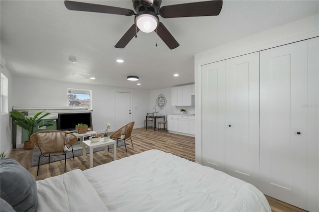 353 Suwanee Ave, Sarasota, FL 34243 - bedroom with a closet, ceiling fan, recessed lighting, and light wood-type flooring
