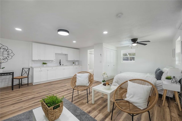 353 Suwanee Ave, Sarasota, FL 34243 - living area with baseboards, recessed lighting, light wood-style floors, and a ceiling fan