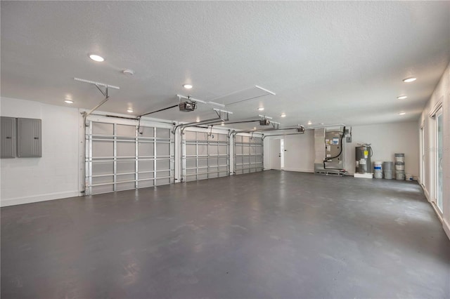 garage featuring electric panel, a garage door opener, heating unit, and electric water heater