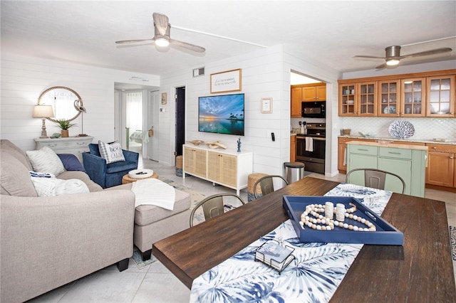 living room with ceiling fan