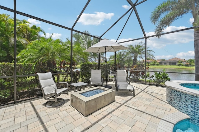 unfurnished sunroom featuring a water view