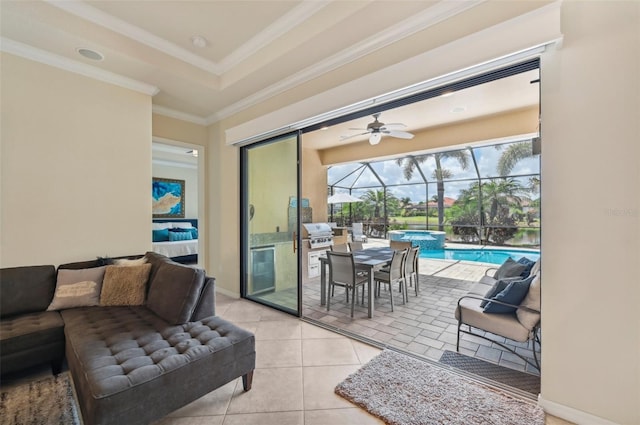 13215 Ramblewood Trl, Bradenton, FL 34211 - living area with crown molding, tile patterned floors, ceiling fan, and a sunroom
