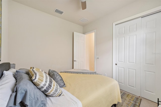 13215 Ramblewood Trl, Bradenton, FL 34211 - bedroom with light colored carpet, a ceiling fan, and visible vents