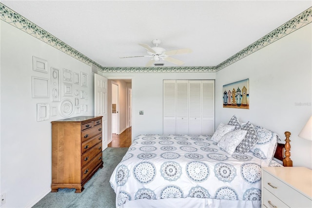 bedroom featuring ceiling fan, carpet floors, and a closet