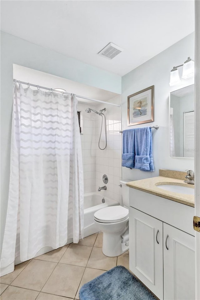 full bathroom with vanity, shower / tub combo, tile patterned floors, and toilet