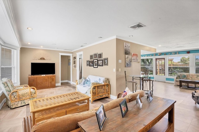 living room with ornamental molding