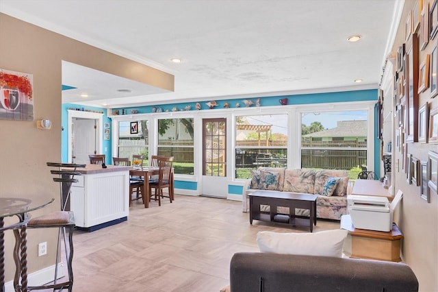 tiled living room featuring crown molding