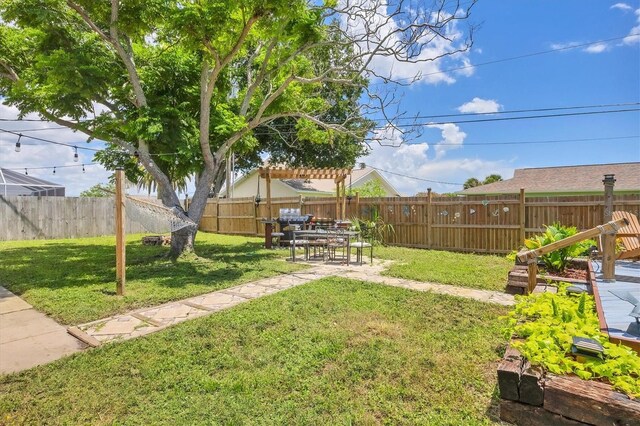 view of yard featuring a patio and a pergola