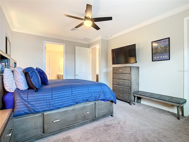 carpeted bedroom featuring connected bathroom, ceiling fan, and crown molding