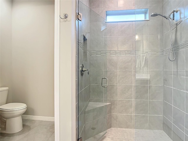 bathroom with toilet, an enclosed shower, and tile patterned flooring