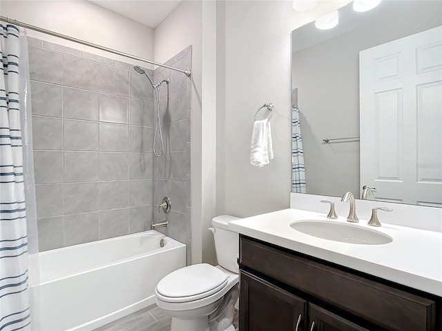 full bathroom with vanity, wood-type flooring, shower / bath combination with curtain, and toilet