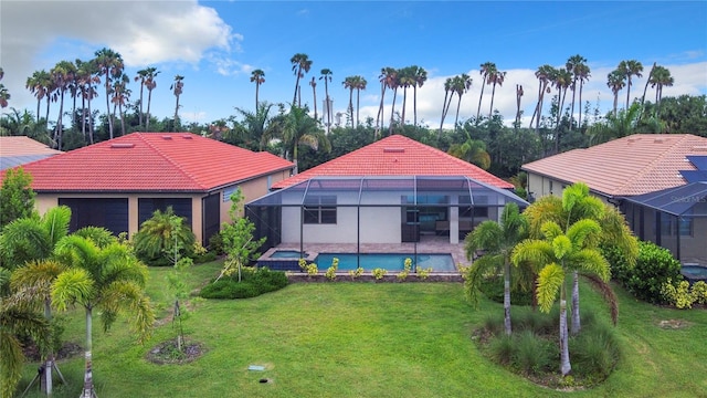 exterior space with glass enclosure and a yard