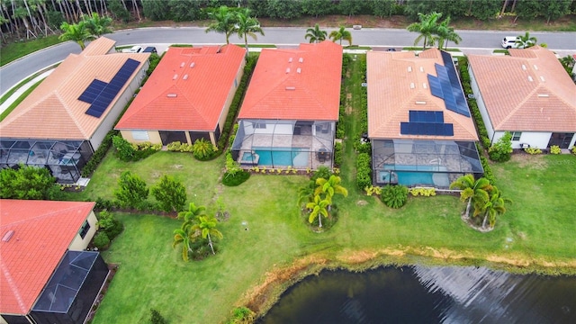 drone / aerial view featuring a water view