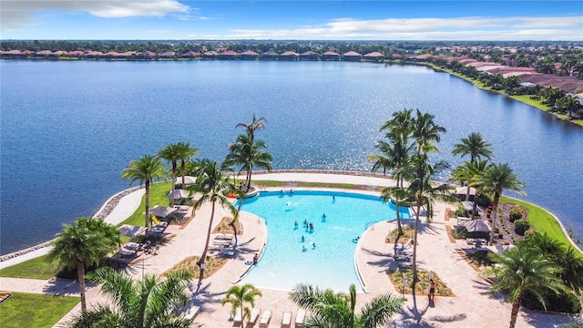 drone / aerial view with a water view