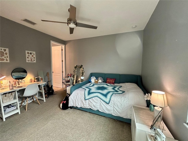 bedroom with ceiling fan and carpet