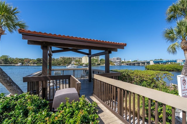 view of dock with a water view