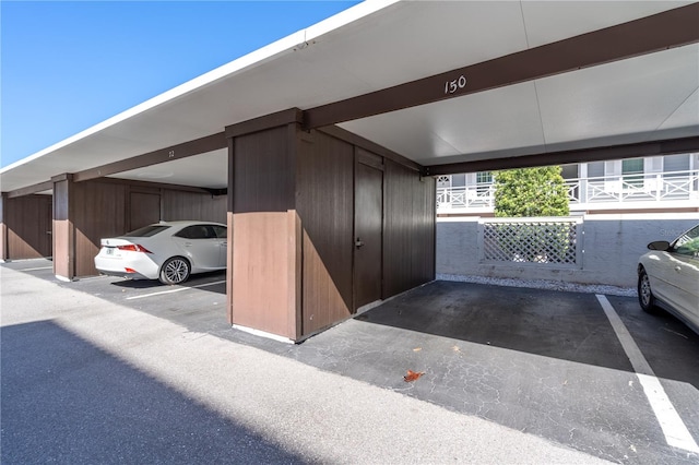 view of parking with a carport