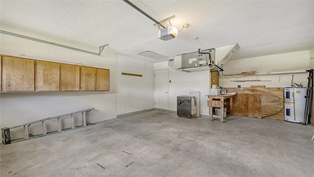 garage with a garage door opener and water heater