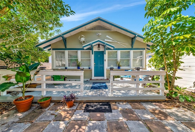 view of front of property featuring a deck