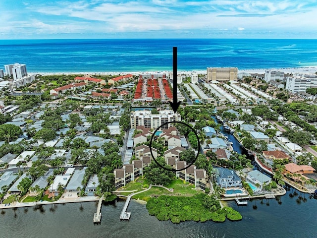 birds eye view of property featuring a water view