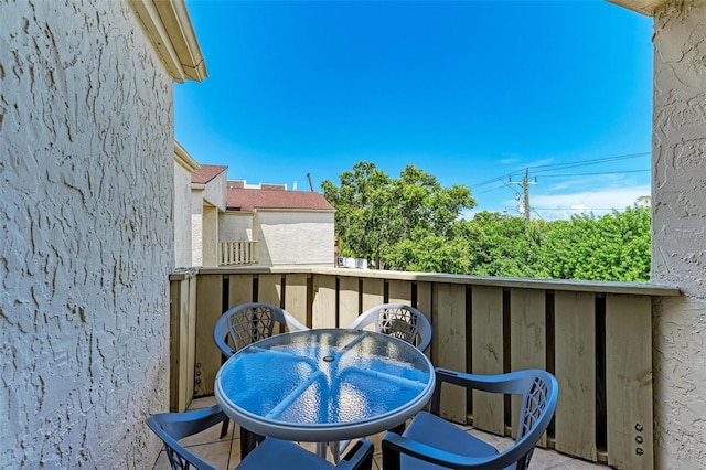 balcony featuring outdoor dining area