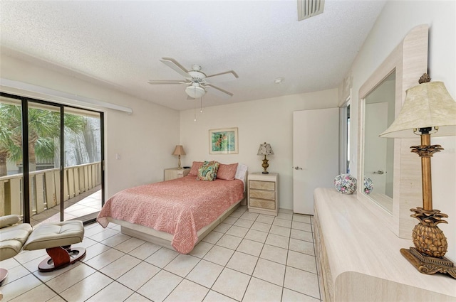 bedroom featuring access to exterior, light tile patterned floors, visible vents, a ceiling fan, and a textured ceiling