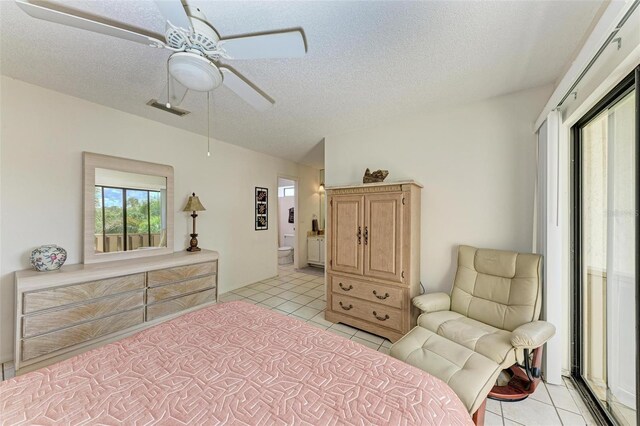 bedroom featuring visible vents, ceiling fan, a textured ceiling, and light tile patterned floors